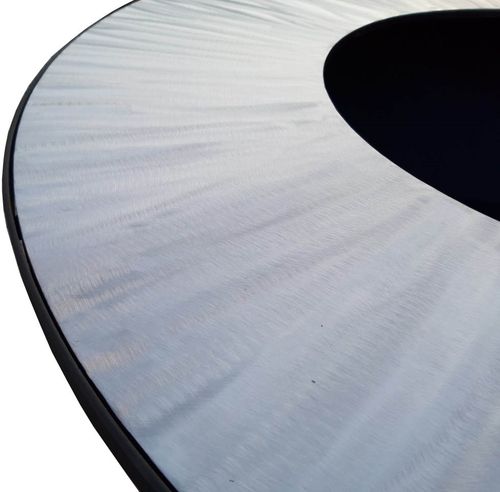 гриль вогнище з круглим диском для жарки на вогні.